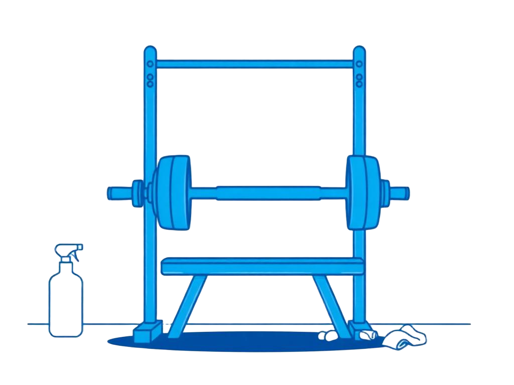 Dumbbell being racked next to a bench and cleaning spray